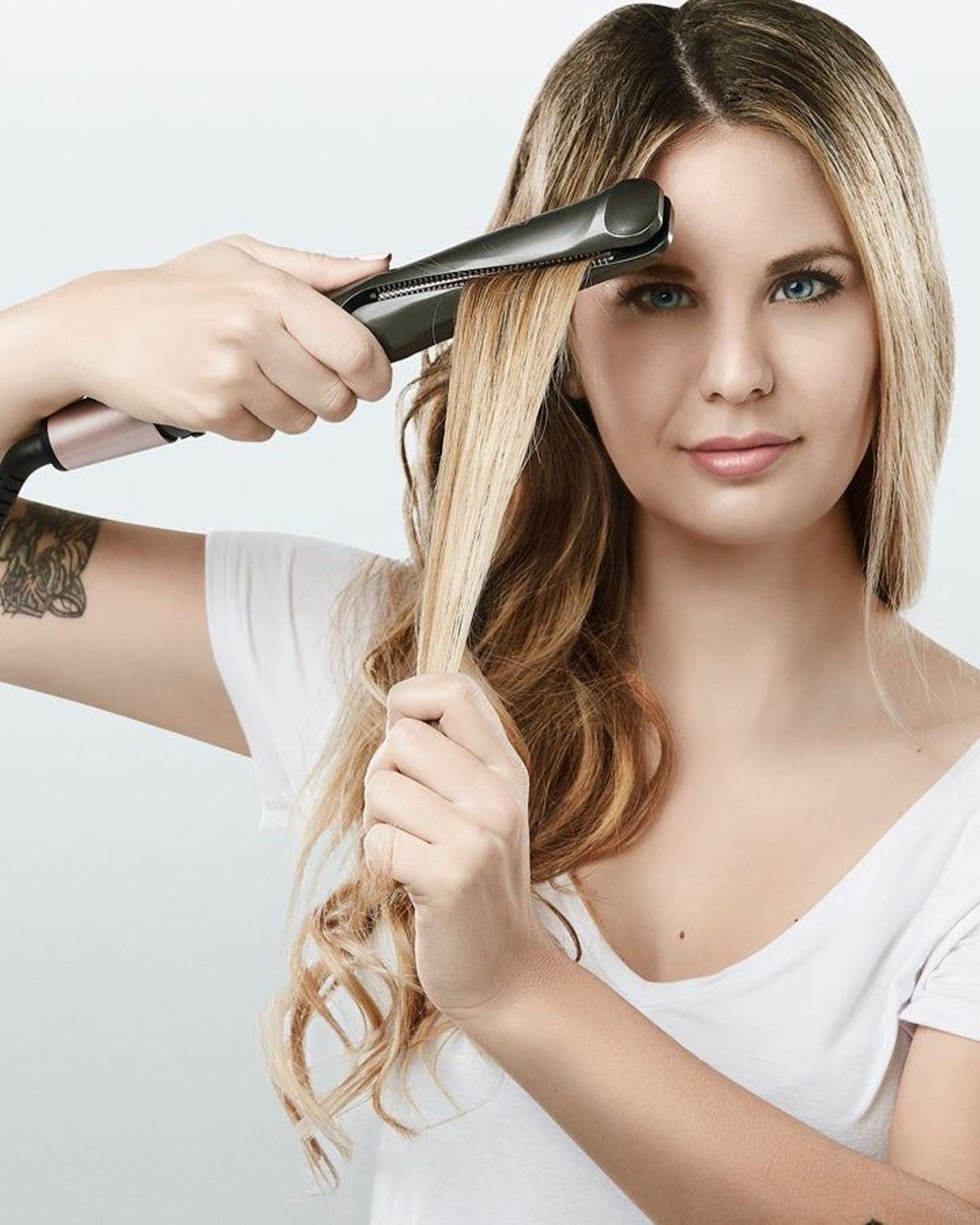 Rizos con la plancha de pelo Curl &amp; Straight Confidence de Remington.