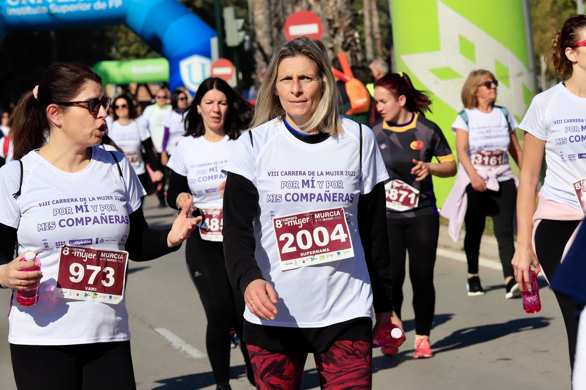 La salida y el recorrido de la Carrera de la Mujer 'inmortalizados' en imágenes