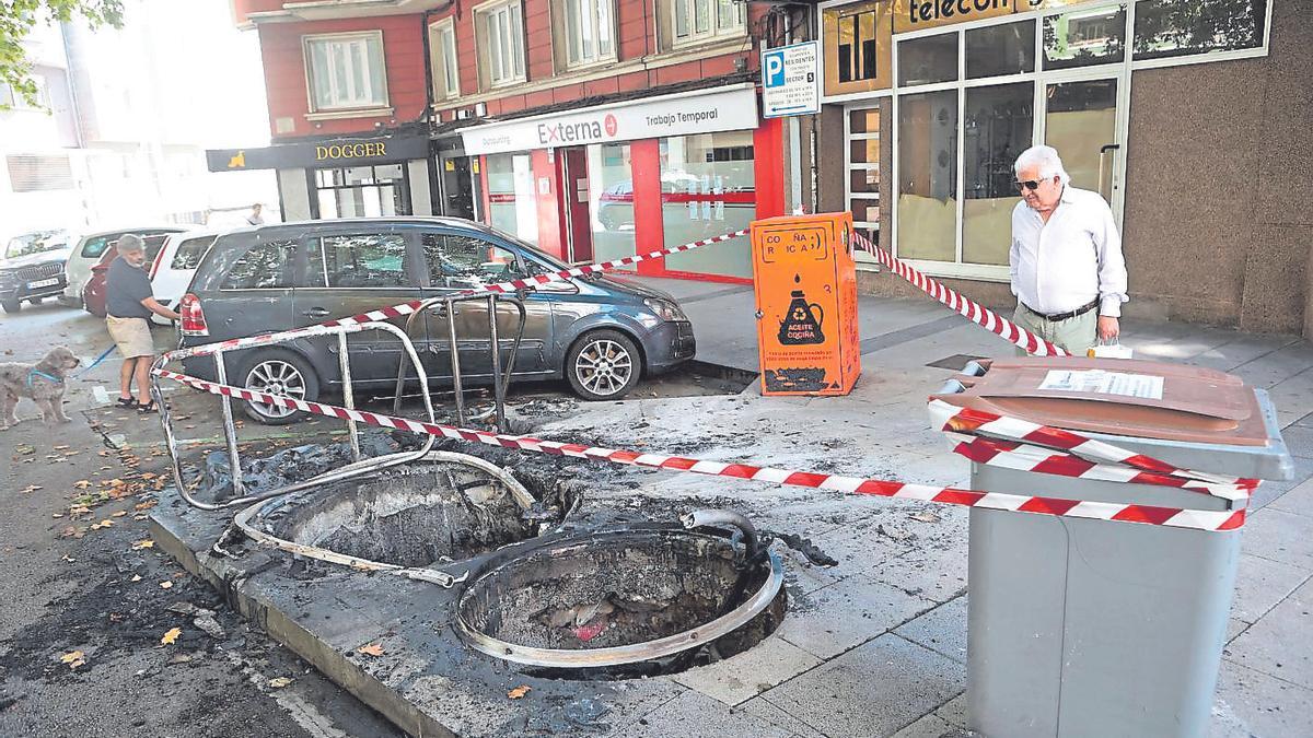 Contenedores quemados en la huelga de 2024.