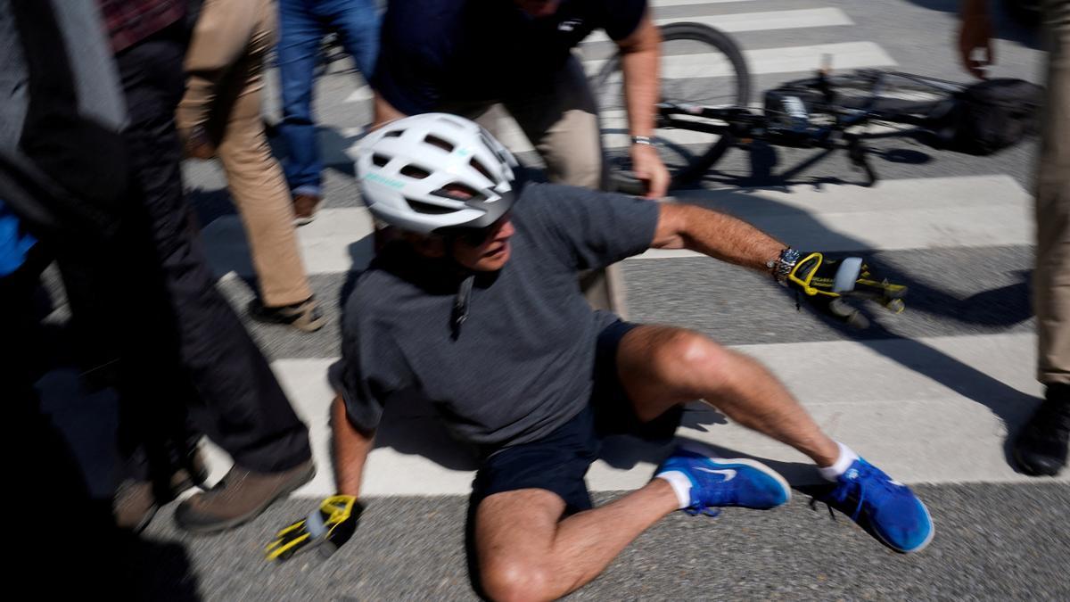 U.S. President Joe Biden falls during a bike ride in Rehoboth Beach, Delaware