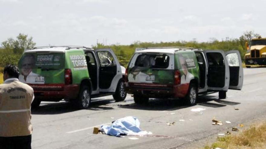 Imagen del candidato asesinado en plena calle.