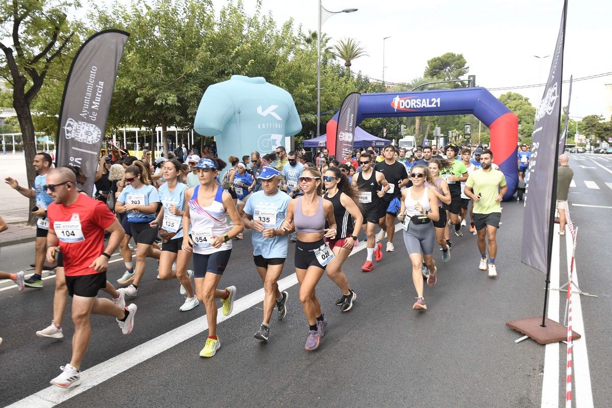 La carrera y marcha Solidaria Asteamur, en imágenes
