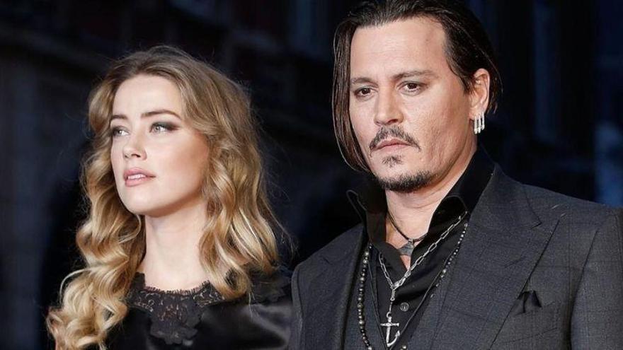 Johnny Depp sigue sin pagar a Amber Heard por su divorcio