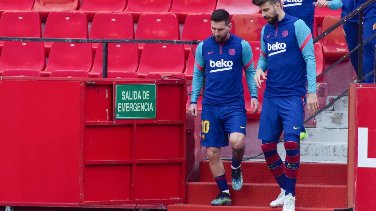 Leo Messi y Gerard Piqué con el FC Barcelona.