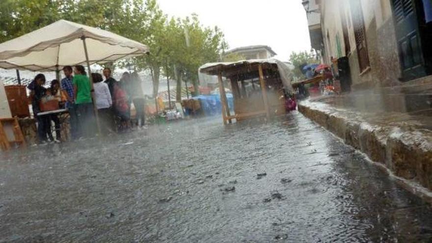 Imagen de la plaza des Pou en un día de lluvia.