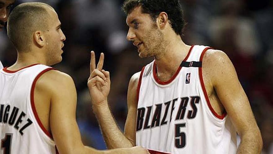 Sergio Rodriguez y Rudy Fernández hablan durante el partido