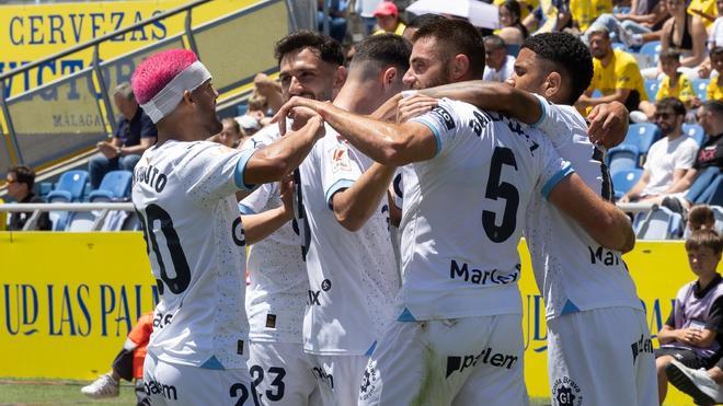 Los jugadores del Girona celebran el tanto de David López ante Las Palmas