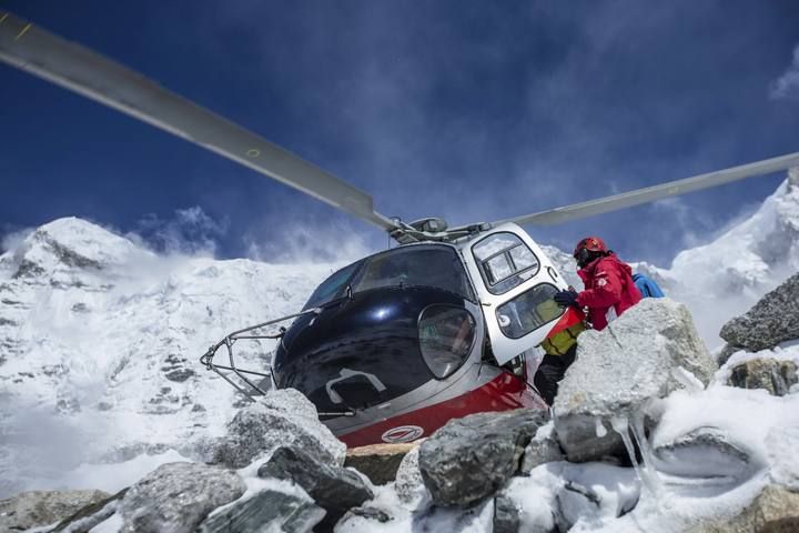 A rescue helicopter is shown at the Mount Everest south base camp in Nepal a day after a huge earthquake-caused avalanche