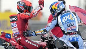 MotoGP race winner Spains Marc Marquez of the Ducati Lenovo Team, left, celebrates with second place Spains Alex Marquez of the BK8 Gresini Racing MotoGP Team in Termas de Rio Hondo circuit, Argentina, Sunday, March 16, 2025. (AP Photo/Gustavo Garello)