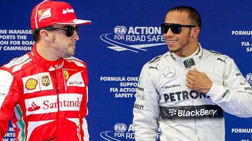 Alonso, junto a Hamilton.