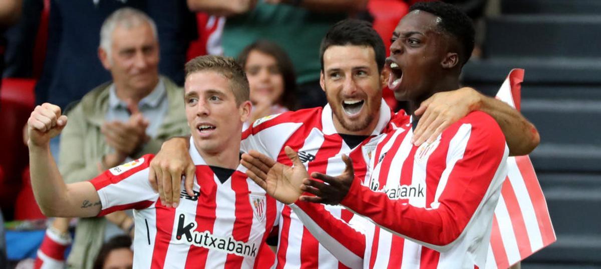Muniain, Aduriz y Williams celebran el segundo gol.