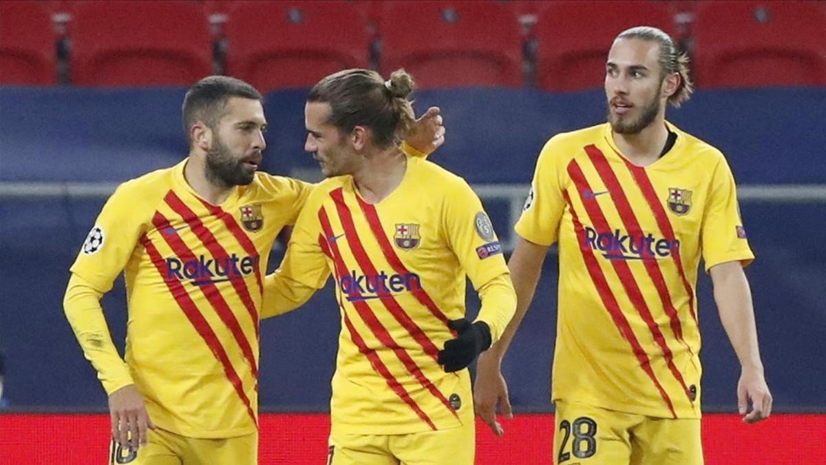 Griezmann celebra su gol con Jordi Alba
