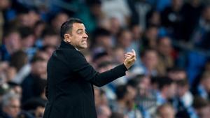 Xavi, durante el derbi barcelonés con el Espanyol en el RCDE Stadium.