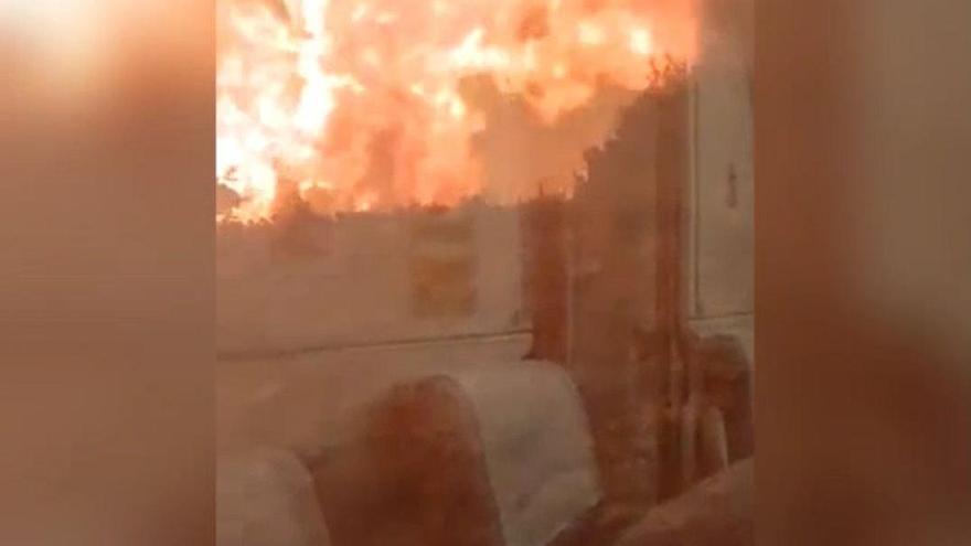 Un pasajero grabó las llamas a escasos metros desde dentro del vagón del tren
