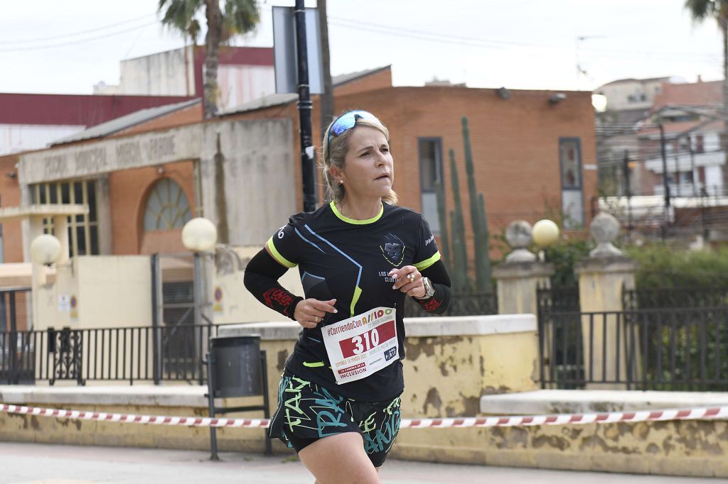 La XIII carrera solidaria Corriendo con Assido, en imágenes