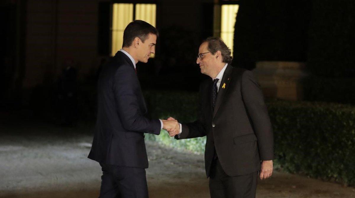 undefined46322604 spain s prime minister pedro sanchez  left  shakes hands wit181220192857