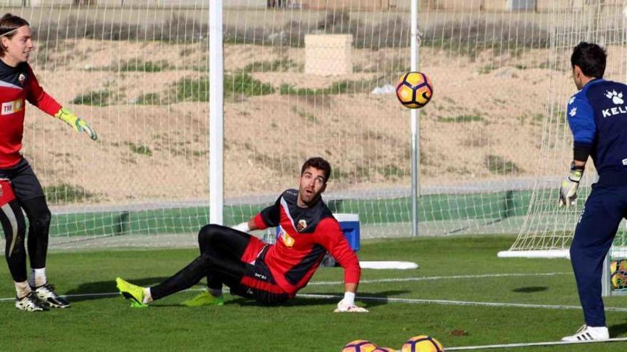 Germán Parreño y David, durante el entrenamiento, junto a Marcos Abad