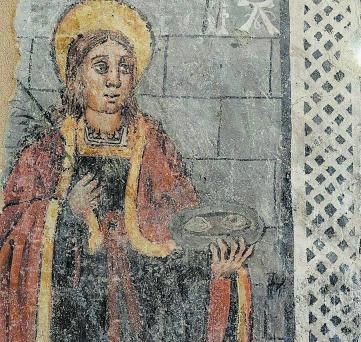 Inscripción que identifica la figura de Santa Lucía en Carbellino