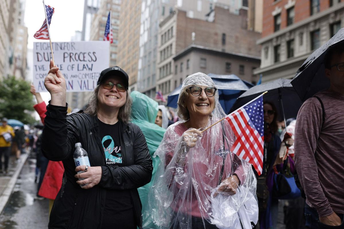 Two women, who wished to not be identified, march during the No Kings protest, Saturday, June 14, 2025, in New York. (AP Photo/Stefan Jeremiah) Associated Press / LaPresse Only italy and spain. EDITORIAL USE ONLY/ONLY ITALY AND SPAIN
