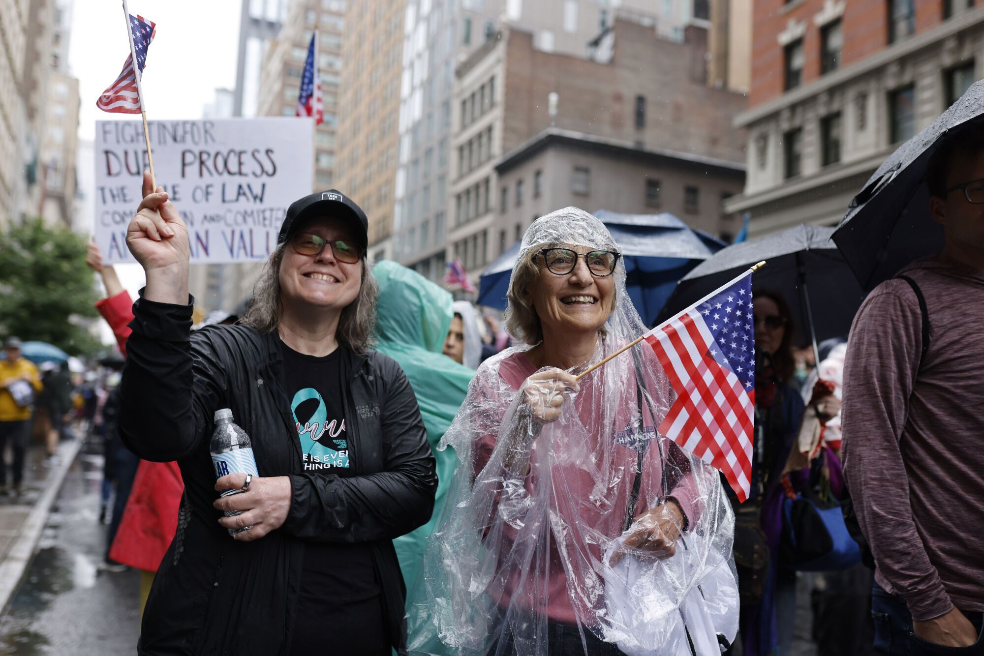 Two women, who wished to not be identified, march during the "No Kings" protest, Saturday, June 14, 2025, in New York. (AP Photo/Stefan Jeremiah) Associated Press / LaPresse Only italy and spain. EDITORIAL USE ONLY/ONLY ITALY AND SPAIN