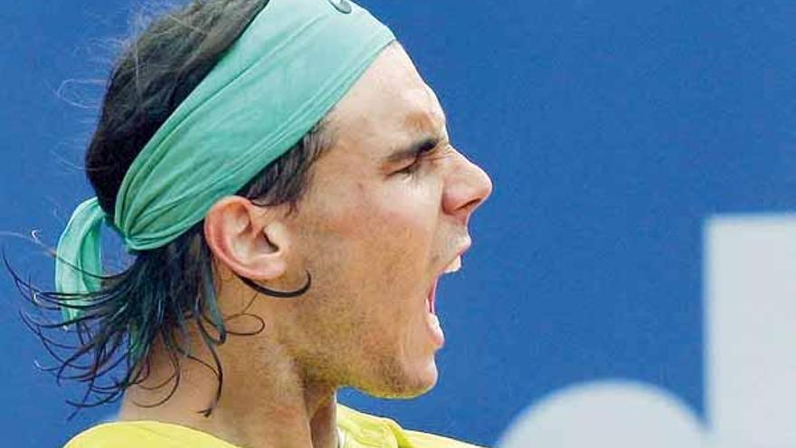 Rafael Nadal celebra un punto ante Davydenko.