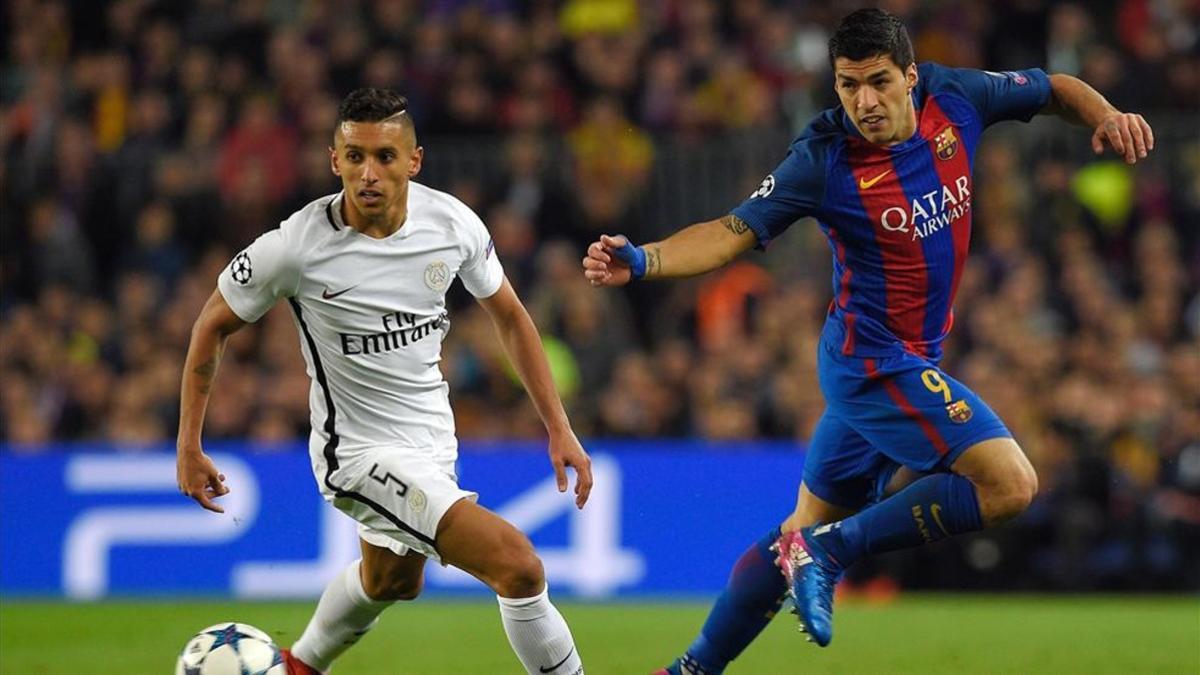 Marquinhos intenta frenar a Luis Suárez en su última aparición por el Camp Nou