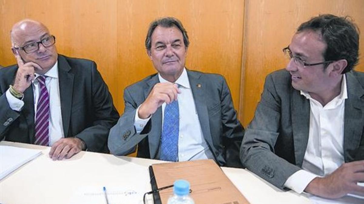 Lluís Corominas, Artur Mas y Josep Rull, en una reunión de la ejecutiva de Convergència.