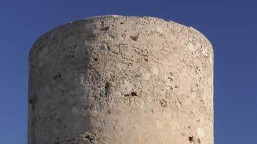 Un grupo de voluntarios en la Torre de Cap Blanc.