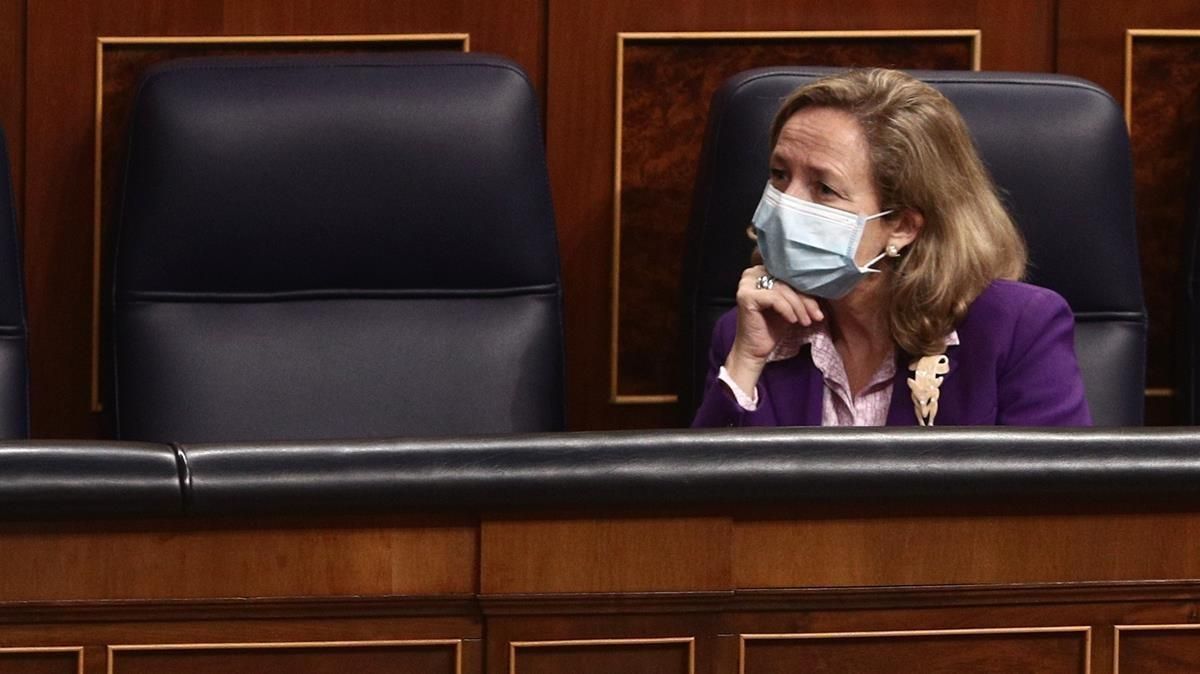 La vicepresidenta Tercera del Gobierno Nadia Calvino durante una sesion plenaria en el Congreso de los Diputados en Madrid (Espana) a 17 de diciembre de 2020 El Pleno del Congreso aprueba hoy la proposicion de ley del PSOE que despenaliza la eutanasia El pleno examina tambien hoy la ampliacion en la concesion de los avales del ICO la moratoria concursal el blindaje a empresas cotizadas la rebaja del IVA a las mascarillas y un credito adicional de 6 000 millones de euros a la Seguridad Social 17 DICIEMBRE 2020 EUROPA PRESS E Parra POOL 17 12 2020 La vicepresidenta Tercera del Gobierno Nadia Calvino durante una sesion plenaria en el Congreso de los Diputados en Madrid (Espana) a 17 de diciembre de 2020 El Pleno del Congreso aprueba hoy la proposicion de ley del PSOE que despenaliza la eutanasia El pleno examina tambien hoy la ampliacion en la concesion de los avales del ICO la moratoria concursal el blindaje a empresas cotizadas la rebaja del IVA a las mascarillas y un credito adicional de 6 000 millones de euros a la Seguridad Social 17 DICIEMBRE 2020 EUROPA PRESS E Parra POOL 17 12 2020