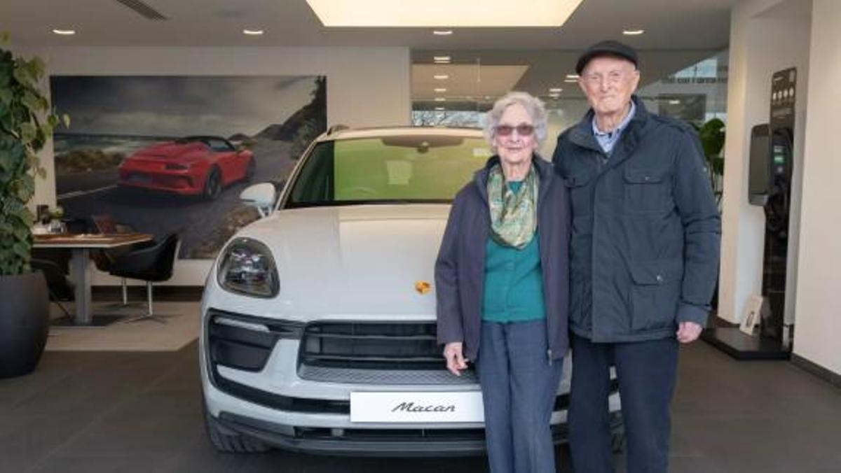 La parella Evans amb el seu Porsche Macan