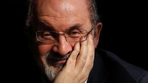 FILE PHOTO: Author Salman Rushdie poses for a photograph after an interview with Reuters in central London, October 8, 2010. Photograph taken on October 8, 2010. REUTERS/Andrew Winning/File Photo