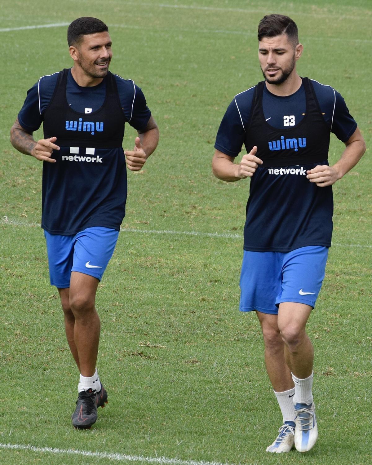 Iván Forte y Cristian López, entrenando al margen del grupo.