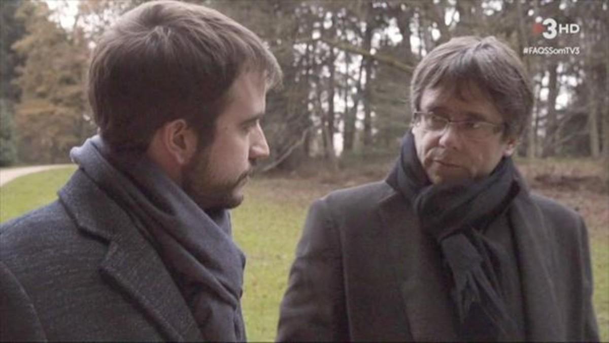 Puigdemont y Ustrell, en un bosque belga.