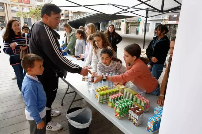 Les imatges del berenar solidari en Vila-real a favor de l'associació de familiars de xiquets amb càncer Aspanion