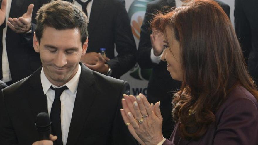 Lionel Messi, junto a Cristina Fernández.