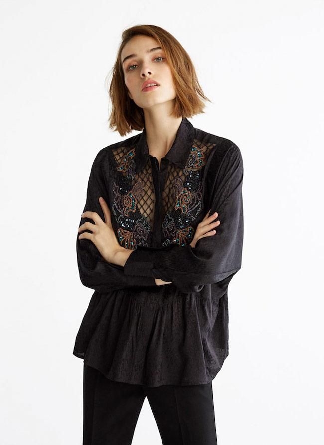 Blusa de encaje con detalles bordados, de Uterqüe