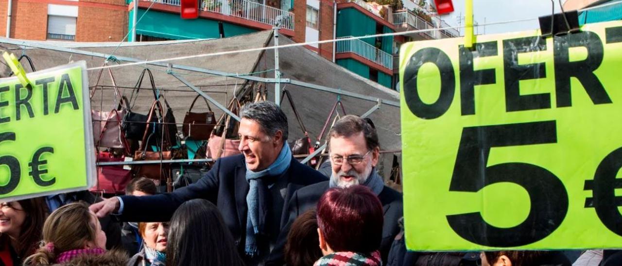 En la foto de portada, Albiol y Rajoy, en el mercadillo de la Salut de Badalona, en la campaña de las autonómicas de 2017.