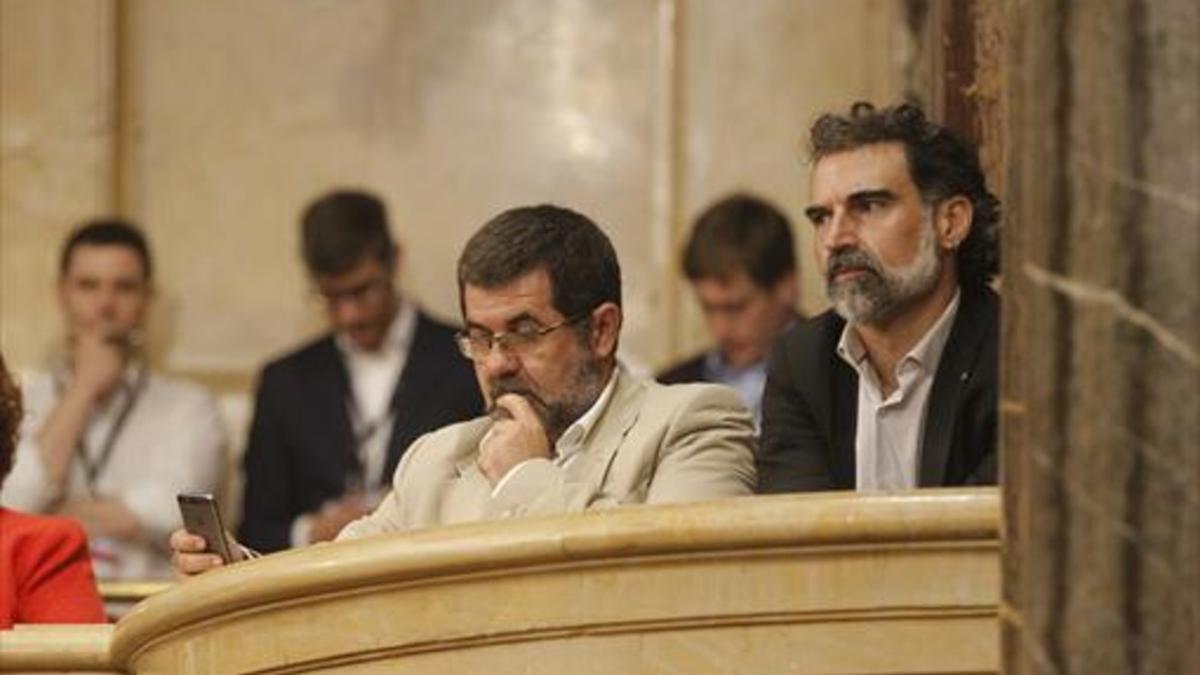 Jordi Sànchez (ANC) y Quim Torra (Òmnium), entre el público.