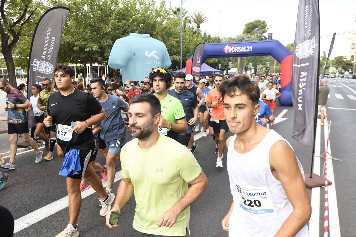 La carrera y marcha Solidaria Asteamur, en imágenes
