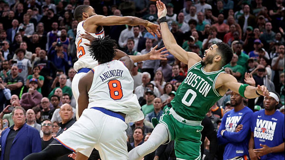 Boston, MA - May 7 - Mikal Bridges #25 and OG Anunoby #8 of the New York Knicks shut down Jayson Tatum #0 of the Boston Celtics in the last second, allowing the Knicks to win Game 2 of the Eastern Conference semifinals at the Garden. (Photo by Matt Stone/MediaNews Group/Boston Herald via Getty Images)