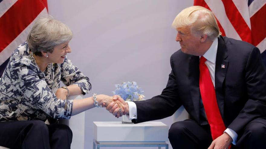 Donald Trump, con Theresa May en la cumbre del G20