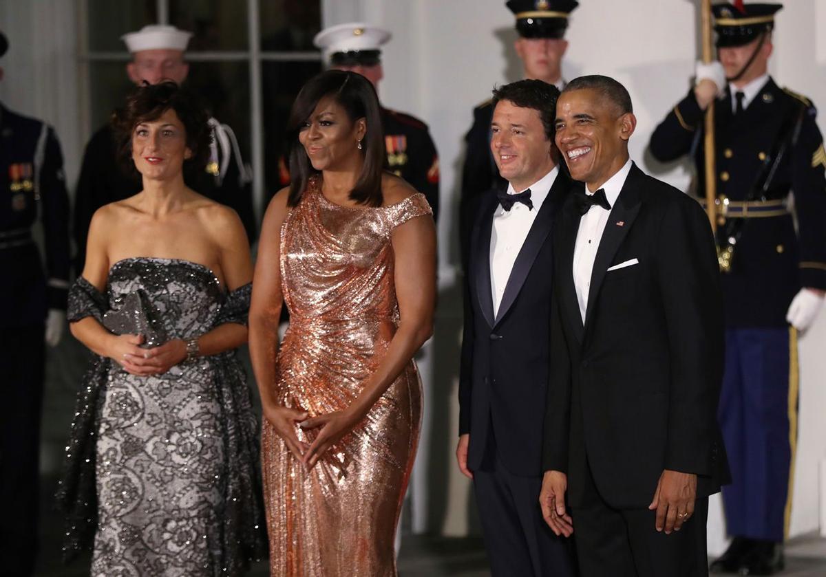 Michelle y Barack Obama junto al primer ministro italiano