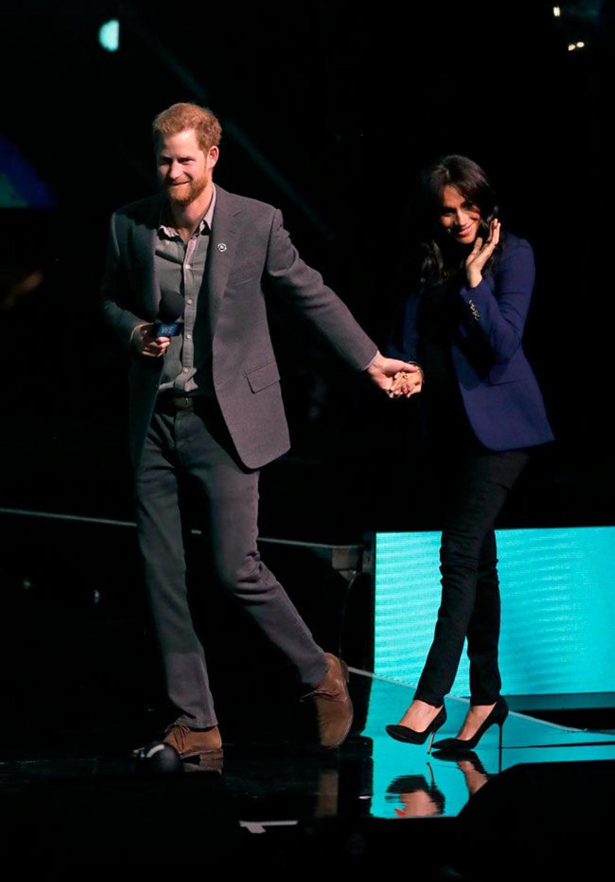 El príncipe Harry saca a Meghan Markle al escenario del 'We Day