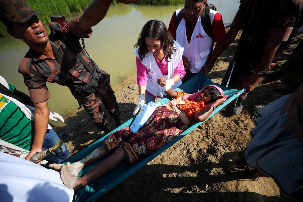 A pregnant Rohingya refugee who is in labour, is ...