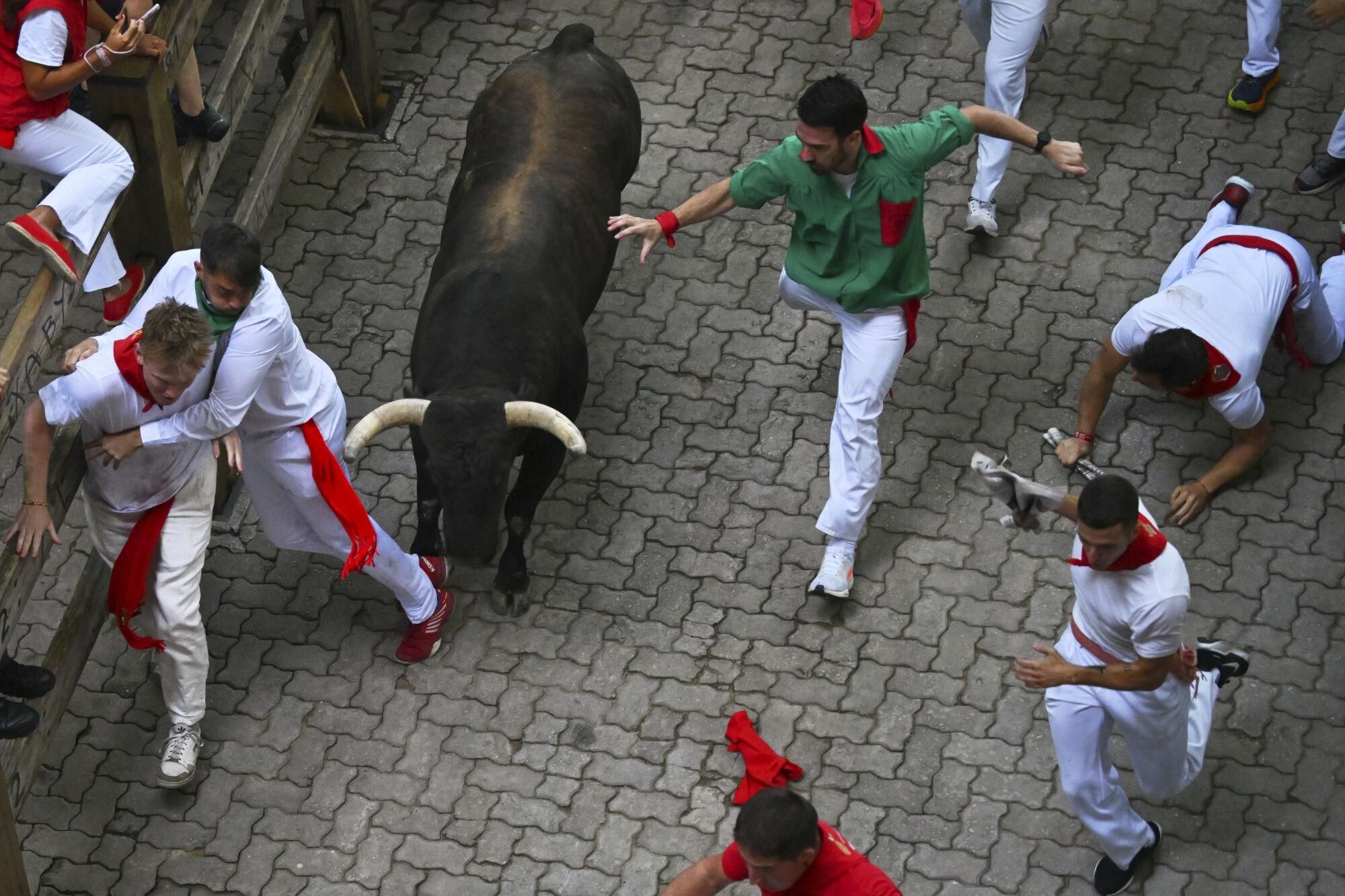 El quinto encierro de los Sanfermines 2025, en imágenes.