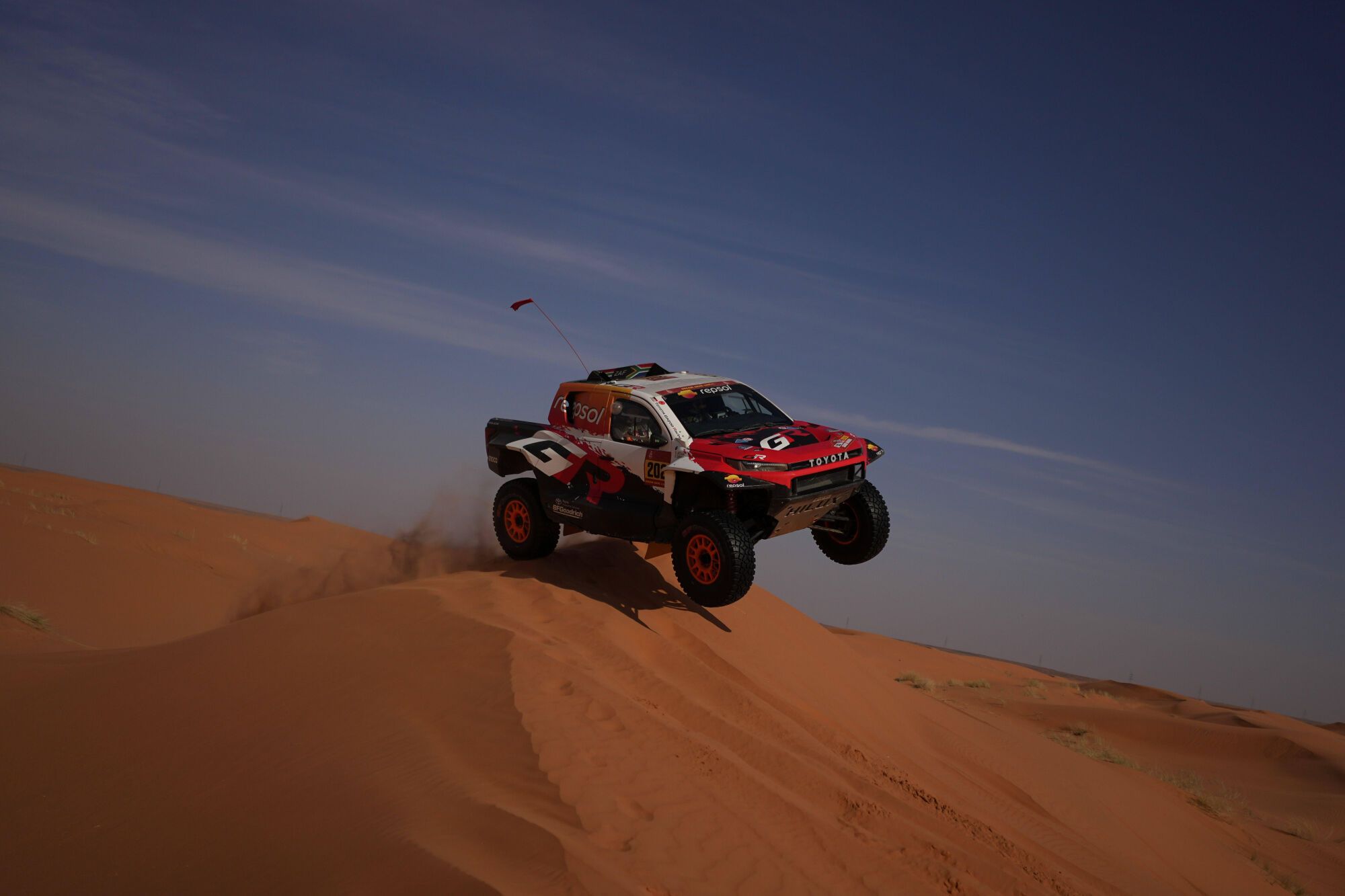 Driver Henk Lategan and co-driver Brett Cummings compete during the sixth stage of the Dakar Rally between Hail and Riyadh, Saudi Arabia, Friday, Jan. 9, 2026. (AP Photo/Thibault Camus). EDITORIAL USE ONLY/ONLY ITALY AND SPAIN