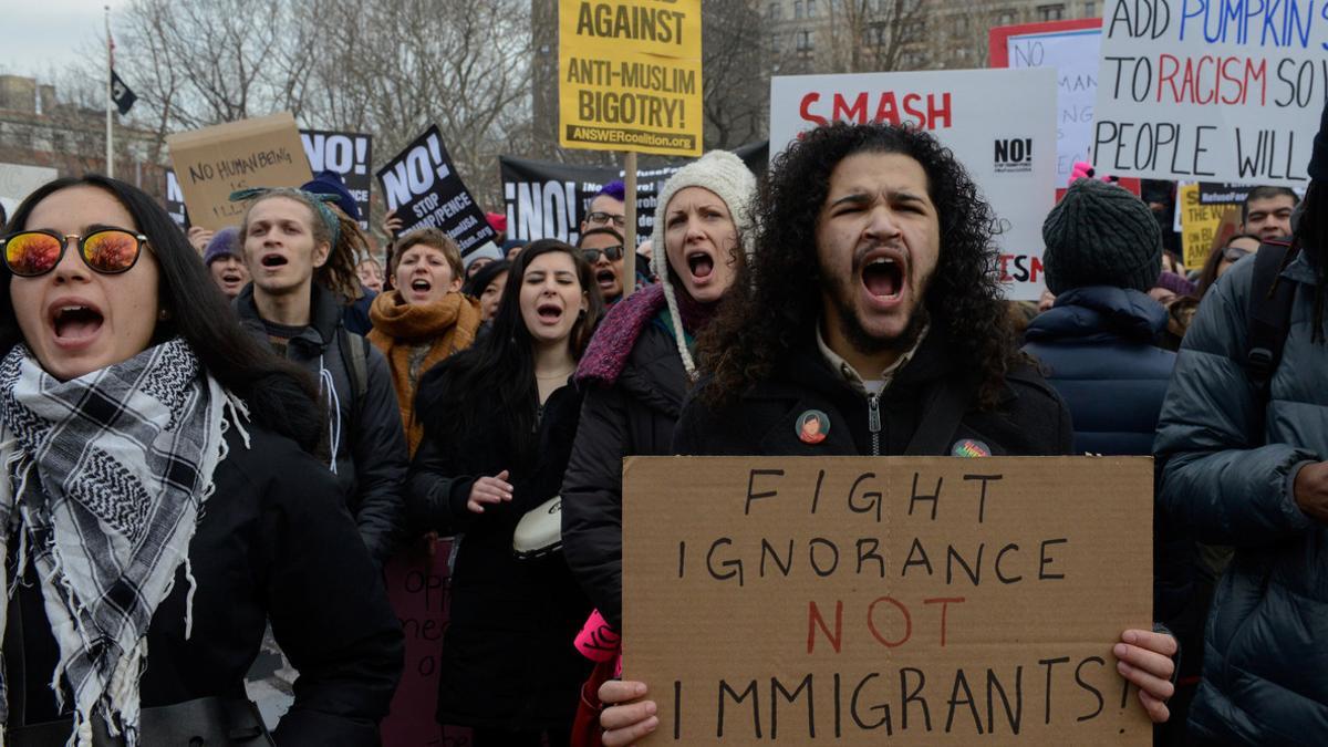 People participate in a protest against U.S. President Donald Trump's immigration policy and the recent Immigration and Customs Enforcement (ICE) raids in New York City