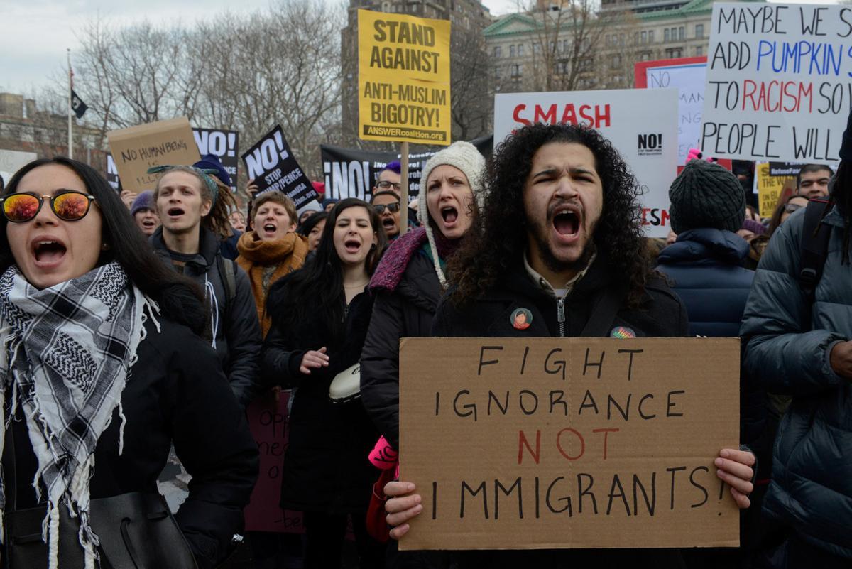 People participate in a protest against U.S. President Donald Trump’s immigration policy and the recent Immigration and Customs Enforcement (ICE) raids in New York City, U.S. February 11, 2017. REUTERS/Stephanie Keith