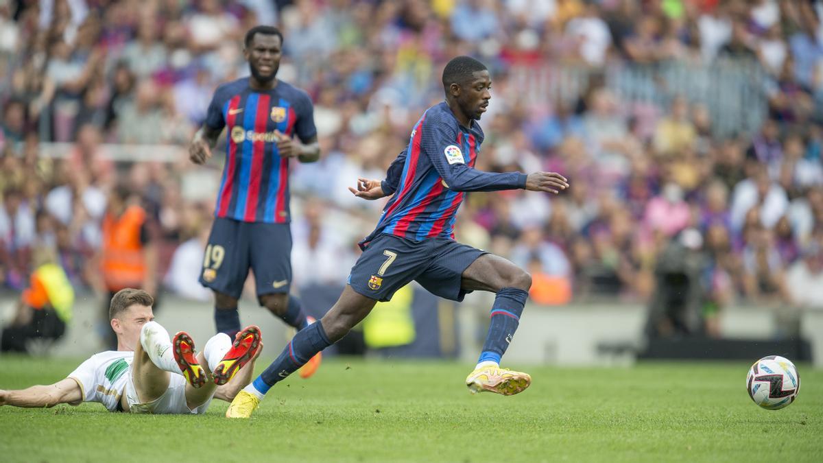 Dembélé y Kessi, durante el primer tiempo.