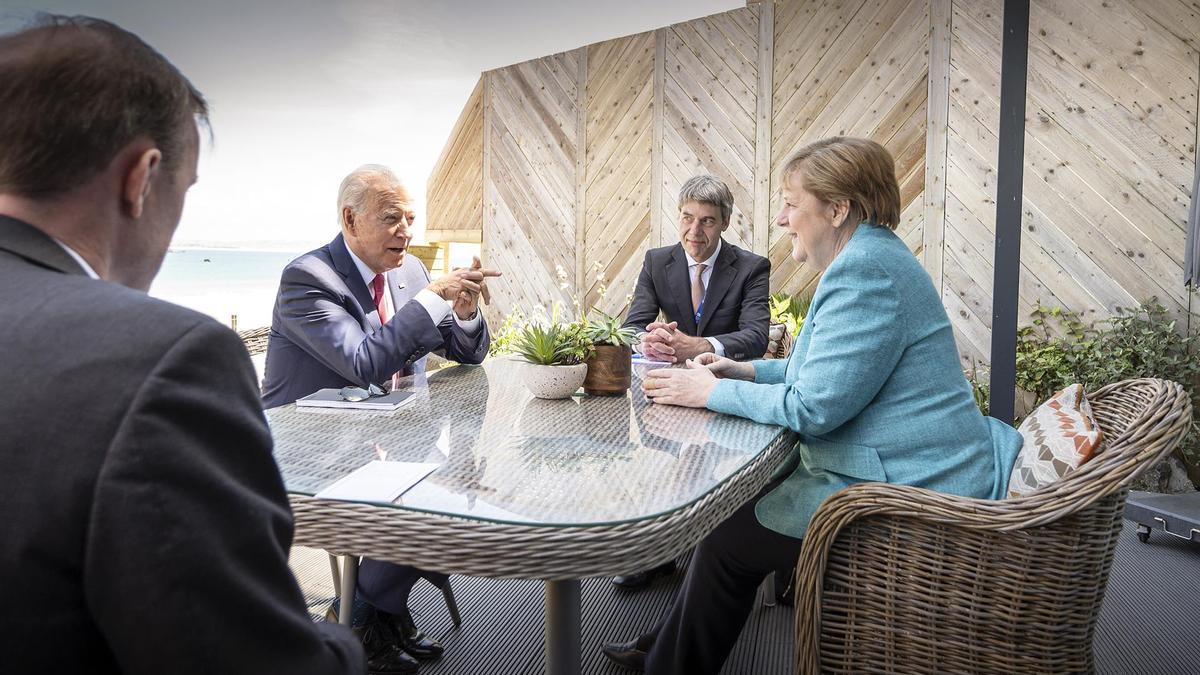 Joe Biden y Angela Merkel.